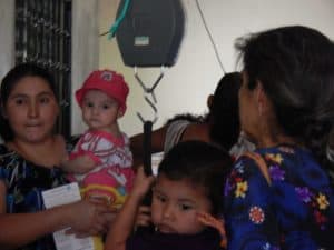 Weighing babies in Magdalena