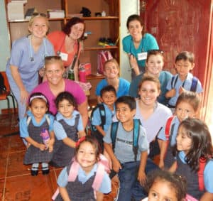 Minnesota brigade with Kindergarten children at Good Shepherd Bilingual School