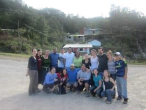 The mandatory group photo - with clinic in background